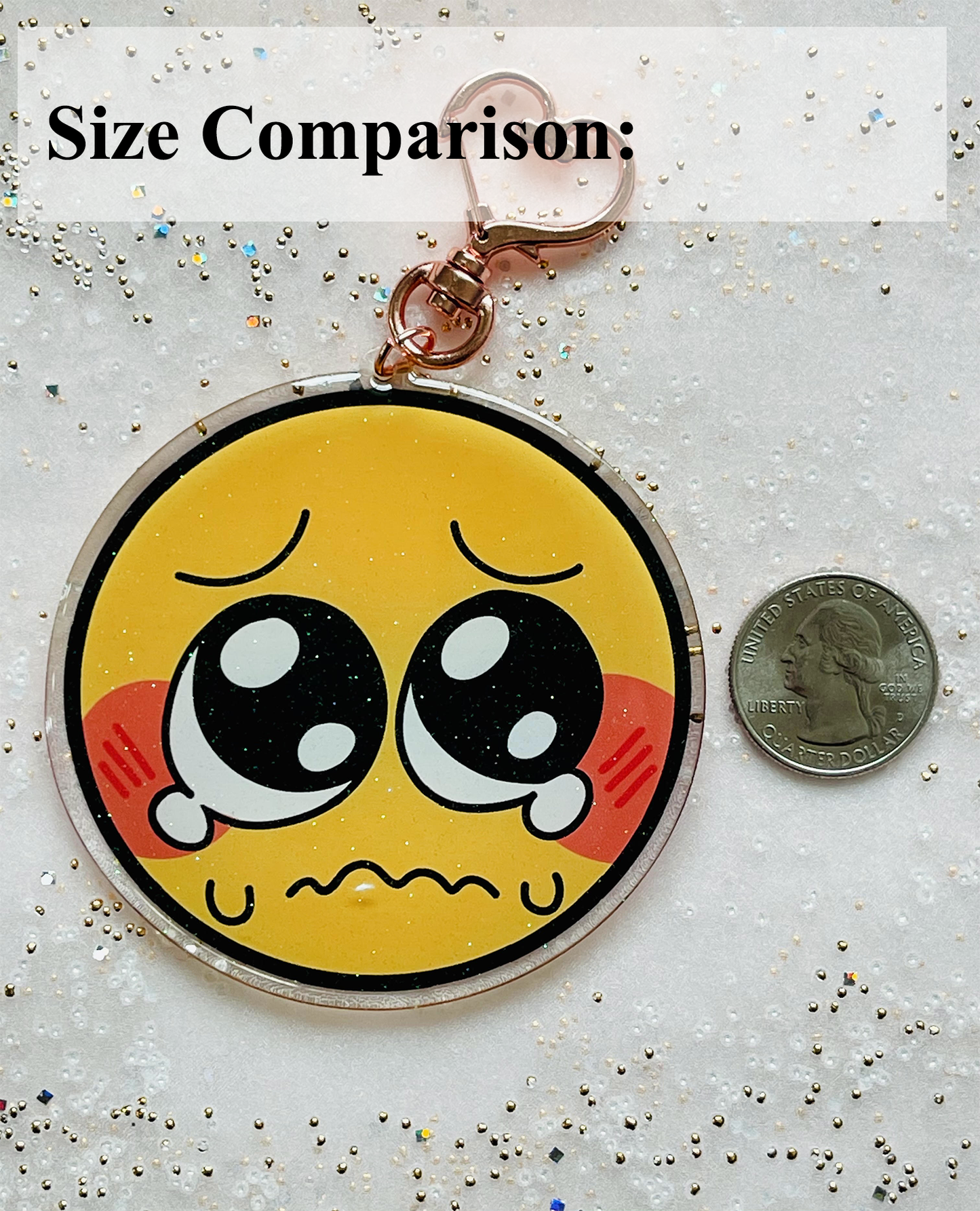 An acrylic charm shown next to a quarter as a size comparison. It is 3 times the size of the quarter.